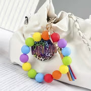 A Rainbow Leopard Print 'MAMA' Beaded Keychain, a Key Ring with Colorful Fringed Pendants, a Fashionable — view 5