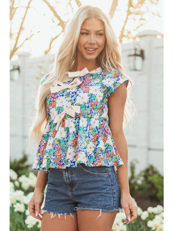 Floral Bow Tie Sleeveless Peplum Blouse