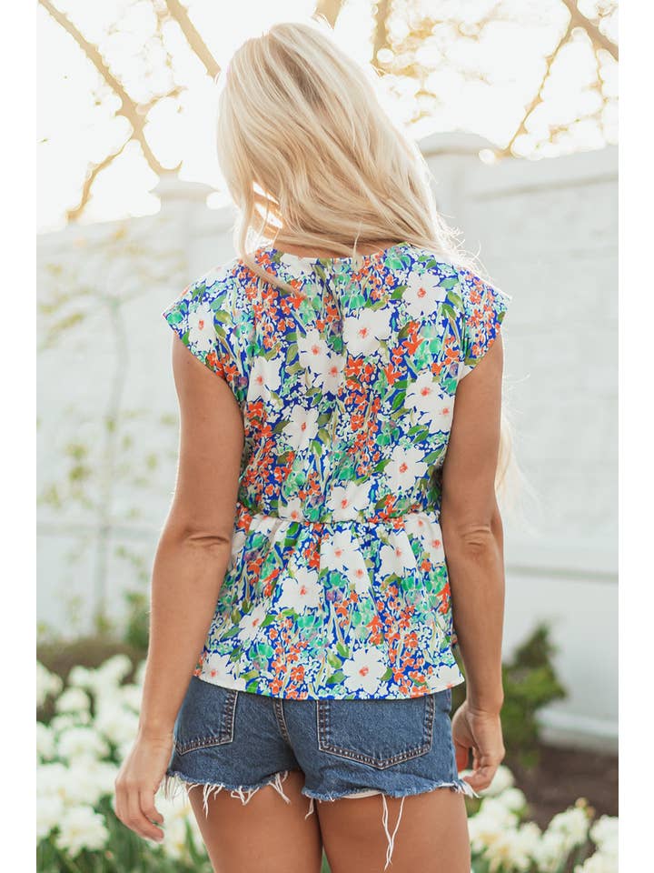 Floral Bow Tie Sleeveless Peplum Blouse