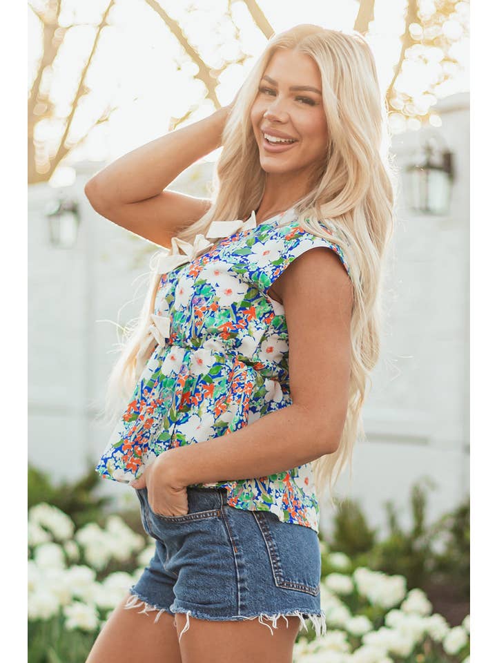 Floral Bow Tie Sleeveless Peplum Blouse