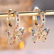 A Pair of Butterfly Hoop Earrings - Golden Synthetic Synthetic Zirconia Earrings - Colorful and Cute Jewelry — view 1